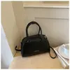 Bolso Tejido Retro Popular de Lujo Ligero Bolso Bowling Gran Capacidad 2026 Bolso de Mano Casual Francés Bolso de Hombro Bolso Cruzado para Mujer