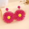 Aretes de flores de color estilo festivo transfronterizo europeo y americano, aretes de rafia tejidos a mano simples de alta gama para verano