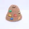En stock Gorro de punto para niños Otoño e invierno nuevo original cochecito pequeño elegante cálido gorro de lana Versátil tocado Transfronterizo
