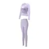 Conjunto de corrida fitness para mulheres, com um estilo suave, top de manga longa e calça atlética de alta elasticidade e modelagem slim, adequado para uso diário e yoga.