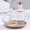 Punto de Venta al por Mayor Botella Vacía Cilíndrica Transparente de Aromaterapia Real Botella de Vidrio sin Llama Adornos de Ratán para Escritorio Interior Hotel