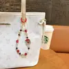 Creativa Nueva Cadena de Teléfono Móvil con Abalorios y Llavero Colgante de Bolsito Lindo de Papá Noel Incrustado de Diamantes Árbol de Navidad Venta al por Mayor