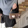 Bolsa Saco Estilo Coreano Xadrez Ins Menina Fofa Acessível Luxo High-End Bolsa de Ombro para o Dia a Dia Retro Bolsa de Moedas Transversal para Crianças