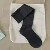 Nueva colección de principios de otoño de 2026: calcetines de algodón para mujer de color liso avena, transpirables, estilo coreano y de longitud media hasta la pantorrilla