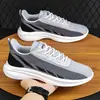 Zapatos de Otoño Transpirables y Cómodos de Tejido Fly-Knit Zapatillas de Correr con Cordones Zapatos Casuales de Malla Zapatos Deportivos Fabricantes Venta al por Mayor Zapatos para Hombre de Talla Grande