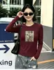 Camiseta de Algodón Acanalado de Manga Larga para Mujer, Top Ajustado Guangzhou Shisanxing, Segunda Entrega Exclusivamente para Camiseta Base de Cuello Redondo, Venta Directa