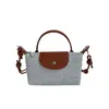 Bolsa de Mão Quadrada Pequena Estilo Coreano Retrô para Mulheres no Atacado, Nova Cor de Verão 2026, Bolsa de Ombro Casual Color-Blocking, Bolsa Transversal Versátil