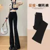 Pantalones acampanados forrados de polar para mujer otoño e invierno 2023 nuevos populares cintura alta adelgazantes gruesos jeans pitillo negros de invierno