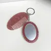 Nuevo Espejo Ovalado Espejo Multifuncional Peine Llavero Moda Versátil Colgante para Bolso/Llave Herramienta de Maquillaje Portátil