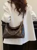 2026 Nova Bolsa de Axila de Couro Wax Oiled Retro para Mulheres Grande Capacidade para o Dia a Dia Corrente Ombro Único Transversal Versátil Bolsa Dumpling