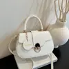 Otoño 2026 Nuevo Bolso Casual Retro de Color Sólido para Mujer Bolso Grande con Solapa para Viajes Diarios Cruzado Debajo del Brazo Bolso de Mujer al por Mayor