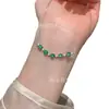 Fábrica atacado fornecimento ao vivo s925 prata incrustada natural material perigoso Yang verde jade sorriso corrente pequena fresco mulheres