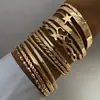 Moda Europea y Americana Nuevo Estilo Moda Personalizada Grabado Trenzado Geométrico Multicapa Apilados Pulseras Set de 10 Piezas Accesorios Al por Mayor