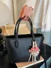 Bolso Cubo Elegante y de Moda de Shuai Mi para Mujer, Nuevo Modelo 2026, Bolso de Hombro Sencillo para el Trabajo, Bolso Cruzado de Hombro de Alto Valor