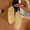Pendientes de mujer transfronterizos europeos y americanos con diseños geométricos irregulares, incrustados con gemas, pendientes de nicho de alta gama al por mayor