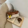 Bolso de Mano Cuadrado Pequeño de Moda Transfronterizo, Nuevo Estilo de Alto Valor, Bolso Kelly de Lujo Ligero para Mujer, Bolso de Hombro y Cruzado de Gama Alta