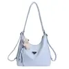 Mochila Retro Super Popular para Mulheres 2026 Novo Modelo Grande Capacidade Bolsa de Ombro Casual Bolsa Transversal de Nicho para o Dia a Dia Moda