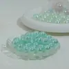 En stock perlas de resina de sirena con cielo estrellado de medio agujero, cuentas de perla, cuentas coloridas de luz de luna, cuentas sueltas, accesorios para el cabello DIY, pendientes, colgantes, adornos