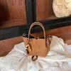 Bolso cubo de color liso simple de moda transfronterizo gran capacidad estilo perezoso temperamento para el trabajo estilo coreano nicho bandolera cruzada