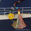 Bolsa con borla Ojo del Dios de la Riqueza de Cinco Vías del Tíbet Cordón Colgante Unisex Material Metálico Colgante para Interior de Coche