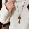 Planeta Mascota Lindo~ Ojo de Tigre Oso de Madera Perro Collar Mujer Otoño e Invierno Lindo Diseño de Nicho Cadena para Suéter Accesorios