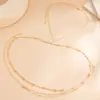 Cadena para el cuerpo de bikini de playa europea y americana sexy con diamantes de imitación y borlas multicapa, cadena de pecho de cuello halter de moda, cadena de cintura integrada