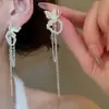 Pendientes Largos de Perlas con Diseño de Pétalos a la Moda, Estilo Versátil de Lujo Ligero, Populares Pendientes y Aretes de Borlas Super Hada para Mujer