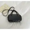 Bolso de Mano Boston de Gama Alta 2026 Nuevo para Primavera/Verano Bolso Cruzado Casual Versátil Bolso de Bowling Dorado