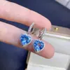 Aretes de topacio con calidad impecable y excelente color de fuego, el tamaño de la piedra principal es de aproximadamente 8*8 mm. Plata 925 incrustación finamente elaborada