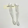 Pendientes Minimalistas de Perla con Forma de Espina de Pescado Diseño de Personalidad Nicho Pendientes de Botón Moda Retro Versátil Pendientes Exagerados