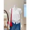Blusa de encaje texturizado con cuello redondo y mangas abullonadas en blanco, hombros descubiertos, de la fábrica original, hecha de tejido de punto Tencel de alta elasticidad