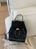 Mochila de Cuadros de Moda para Mujer 2026 Nueva Bolso de Hombro Versátil y a la Moda con un Toque de Lujo para la Clase y el Trayecto