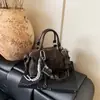 Bolso Retro Boston Pu para Mujer 2025 Nuevo Versátil para Viajar al Trabajo Hombro Cruzado Pequeño Cuadrado Portátil Tipo Almohada