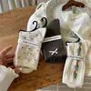 Estilo designer Songmu; meias com laço para mulheres, meias de cano médio, estilo coreano, design original de nicho, meias largas versão coreana para mulheres
