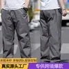 Pantalones casuales de talla grande para hombre de Amazon transfronterizos, nuevo estilo primavera/verano, extragrandes para personas altas y corpulentas, pantalones largos rectos holgados elásticos