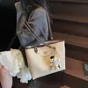 Bolsa Tote de Ombro Grande Capacidade com Textura Retrô Feminina 2025 Novo Estilo Coreano Moda Cor Contrastante Bolsa de Ombro para o Dia a Dia Tendência
