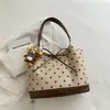 Popular Bolsa de Lunares de Gran Capacidad para Mujer 2026 Nueva Versátil para el Trabajo Bolso de Hombro Único Bolso Tote Casual de Mano