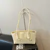 Bolso de axila para mujer estilo vintage para comercio exterior, nuevo modelo de verano 2026, bolso tote de alta calidad, versátil para ir al trabajo, bolso de mano y bolso de hombro