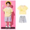 Traje de porrista para el Día del Niño para estudiantes de primaria, conjunto de uniforme de clase para el día del deporte escolar, disfraz de lunares con falda corta para jardín de infantes
