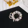 Broche Transfronterizo Nuevo de Alta Gama Lazo Insecto Flor Femenino Anti-Exposición Fijo Ropa Versátil Corsage