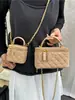 Bolso pequeño cuadrado cruzado de un solo hombro con patrón de diamantes 2026 transfronterizo, bolso tipo caja popular estilo coreano, monedero elegante de alta gama