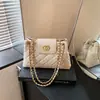 Bolso de mano para mujer 2026 verano nuevo retro con cadena y patrón de diamantes con cierre de candado, bolso cruzado cuadrado pequeño versátil para el trabajo