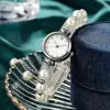 Reloj de mujer de cuarzo perla, nuevo, elegante y con estilo, de venta caliente, pulsera redonda ajustable libremente para estudiantes mujeres, al por mayor