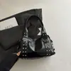 Bolsa de Hombro Retro de Comercio Exterior para Mujer 2026 Nueva Transfronteriza Estilo Punk para el Trabajo Versátil Estilo Motociclista con Remaches de Hombro de Moda