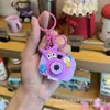 Llavero de Cámara de Proyección de Dibujos Animados Sanrio Colgante para Bolso Juguete para Niños Colgante Luminoso Pequeño Regalo Venta al por Mayor