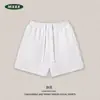 Shorts esportivo masculino INS de cor sólida 450G, estilo americano moderno, versátil para o verão, estilo de rua, solto e confortável, adequado para estudantes, comprimento até o joelho