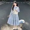 Conjunto de Otoño para Niña Conjunto de Tres Piezas 2026 Nuevo Estilo Chaleco Camisa Falda Lazo Infantil de Otoño Versión Coreana