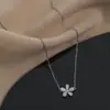 Cadena para Clavícula Elegante con Baño de Oro Real y Circonita Microincrustada Diseño de Nicho Femenino Sentido del Diseño Collar de Ojo de Gato Pétalo Collar Versátil