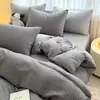 Nuevo juego de cuatro piezas de sábanas y funda de edredón, suave y amigable con la piel, juego de ropa de cama de estilo ins simple para dormitorio y habitación