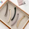 Qiyue grampo de cabelo para PC transfronteiriço prendedor de banana artefato fixador de rabo de cavalo alto clipe de torção simples acessórios de cabelo mais vendidos em Yiwu atacado